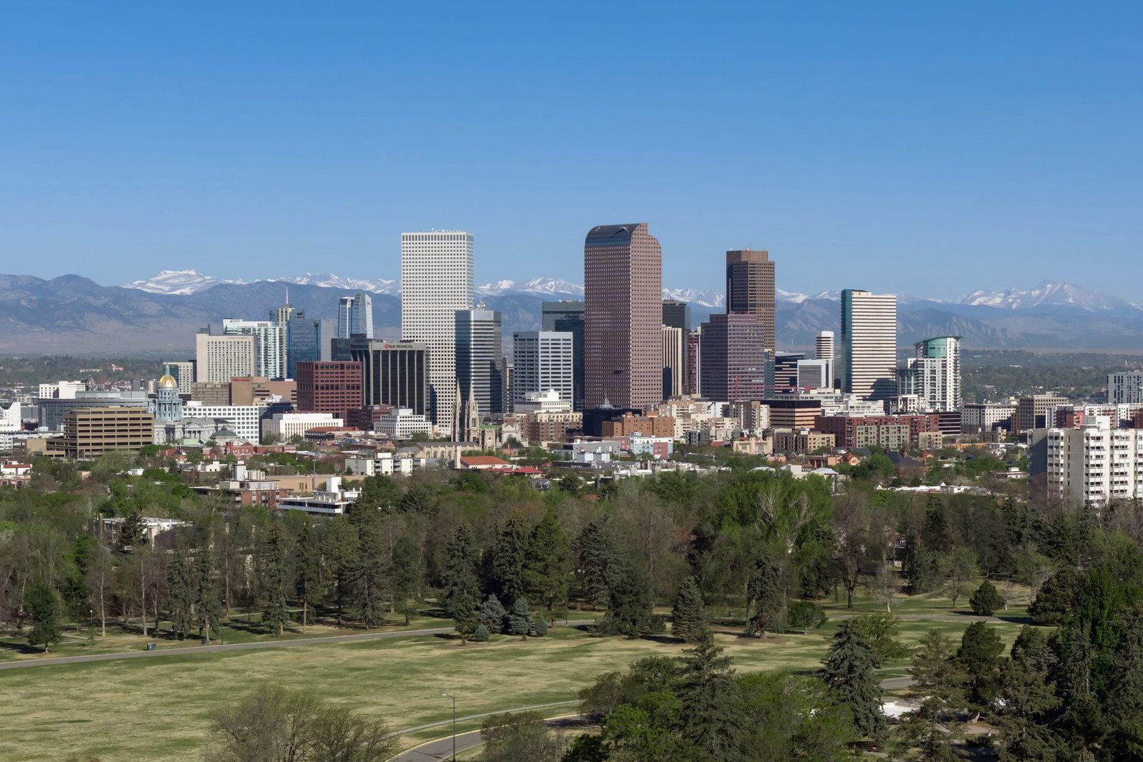 Denver Colorado skyline with the Rocky Mountains behind