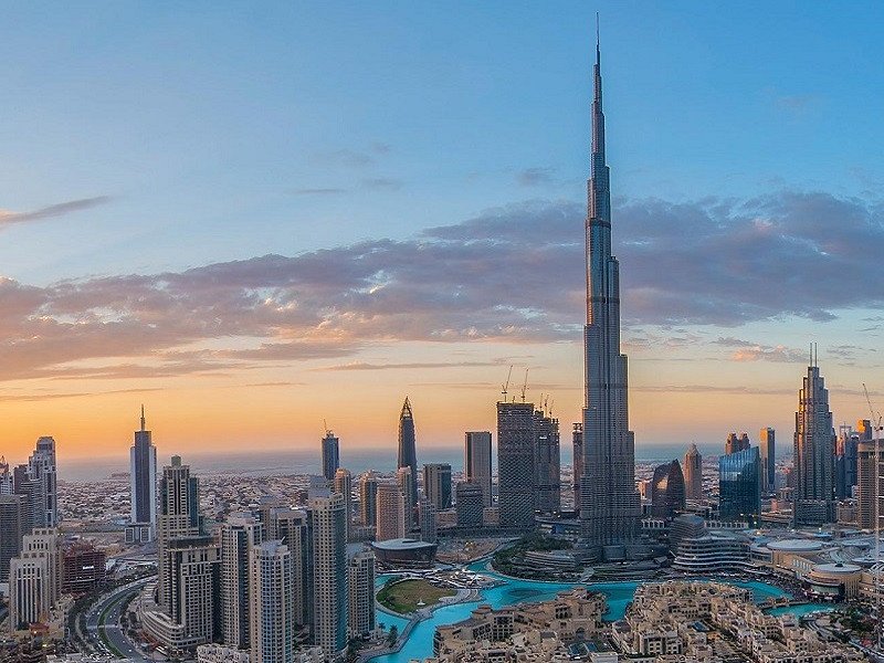 The Burj Khalifa and downtown Dubai skyline at sunset