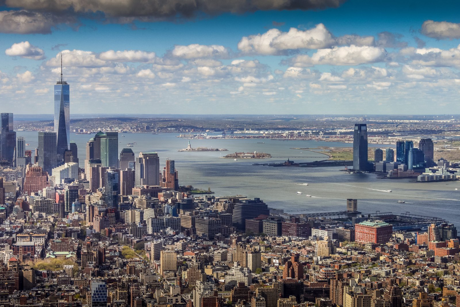 Lower Manhattan skyline with the Statue of Liberty in New York Harbor